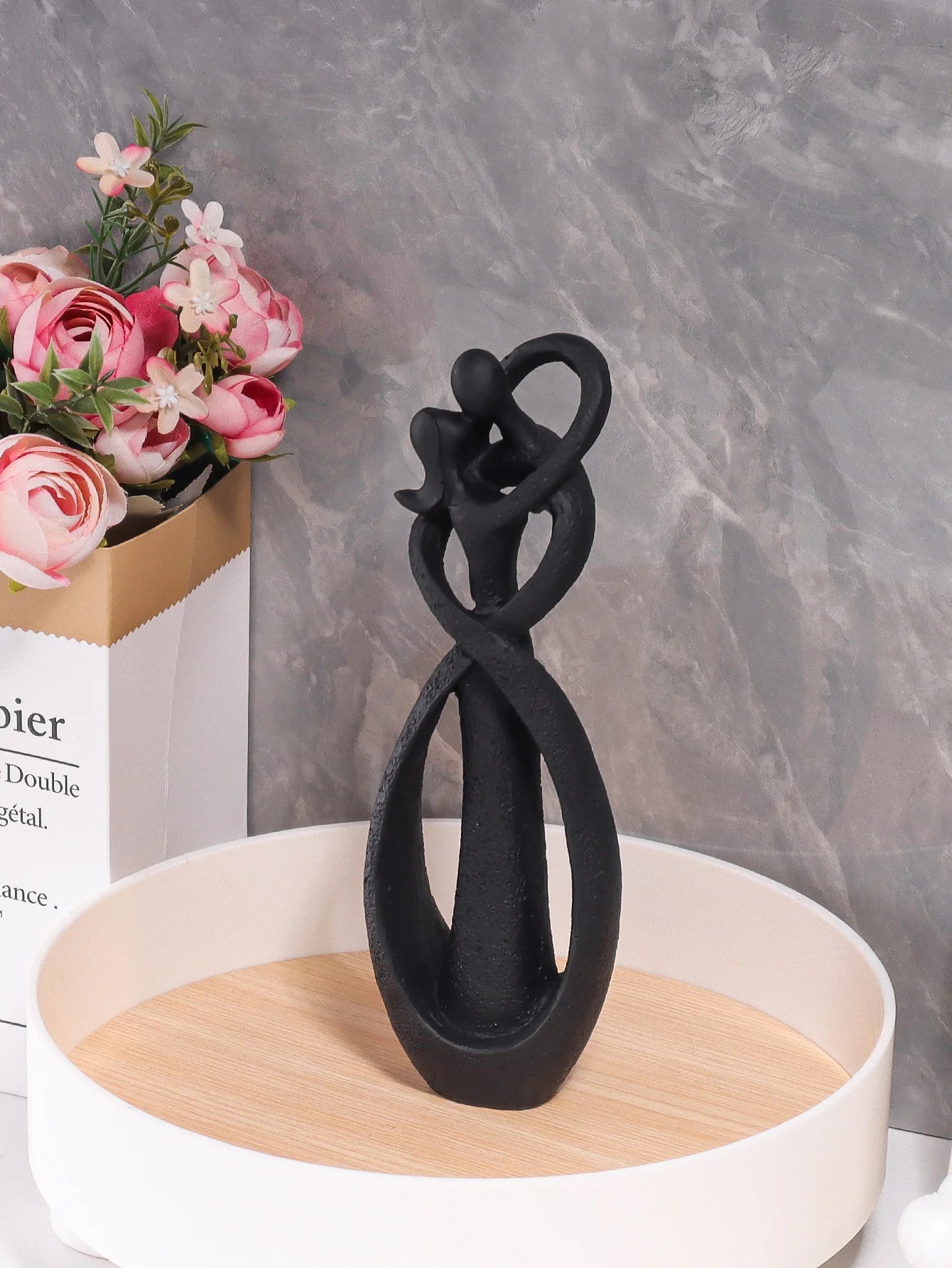 Embracing Couple Sculpture