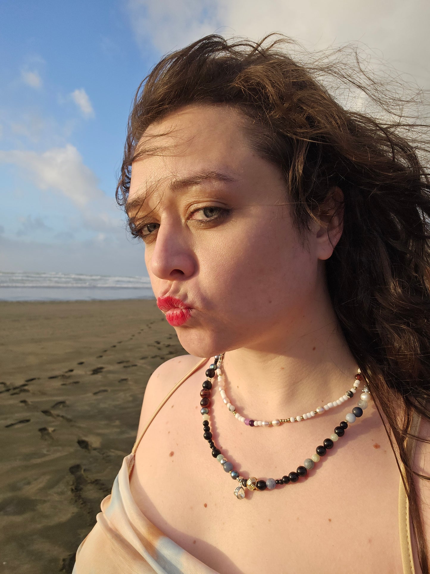Woman on a beach with a clear sky