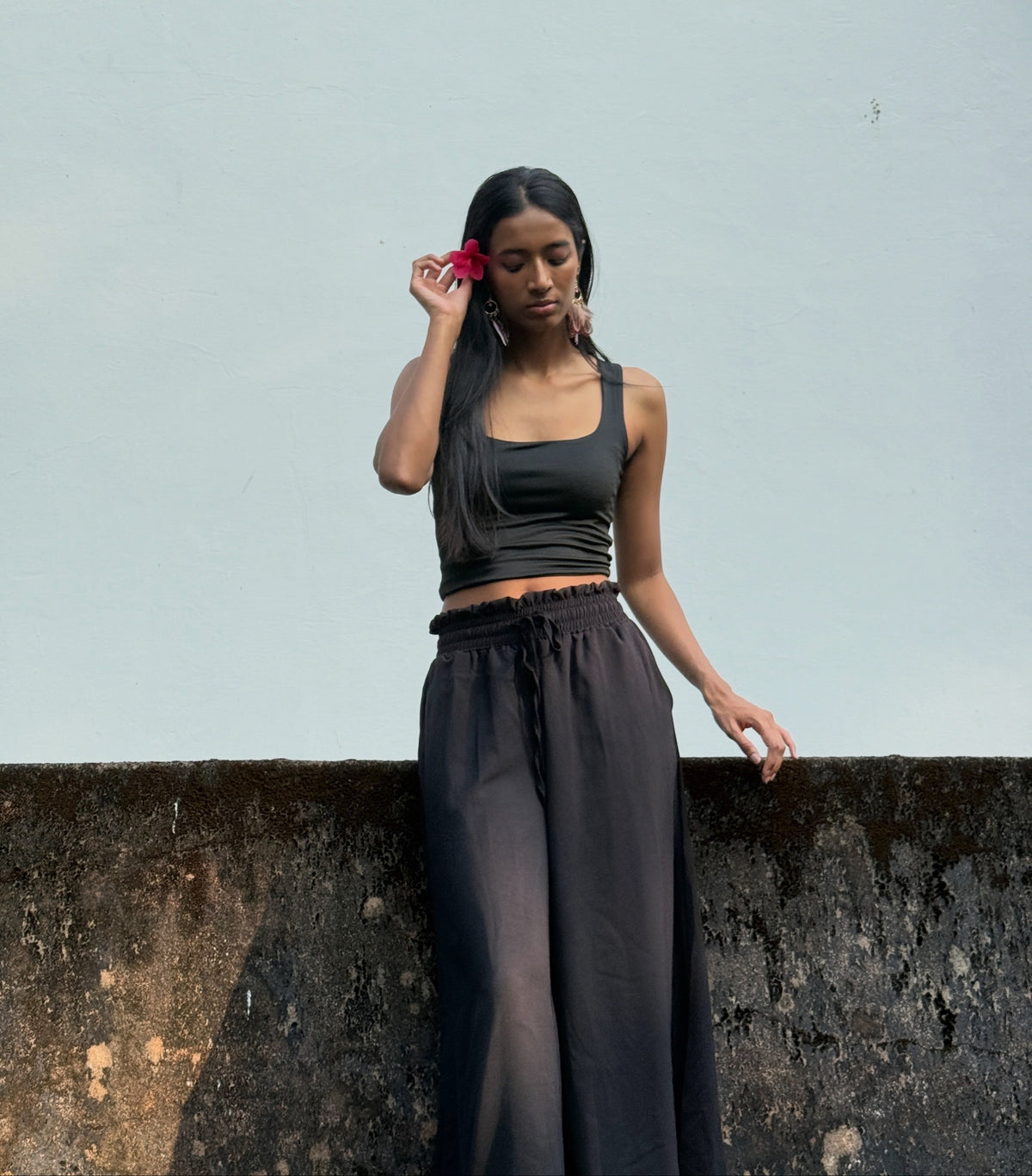 Black sleeveless crop top with long flowy skirt, boho style outfit