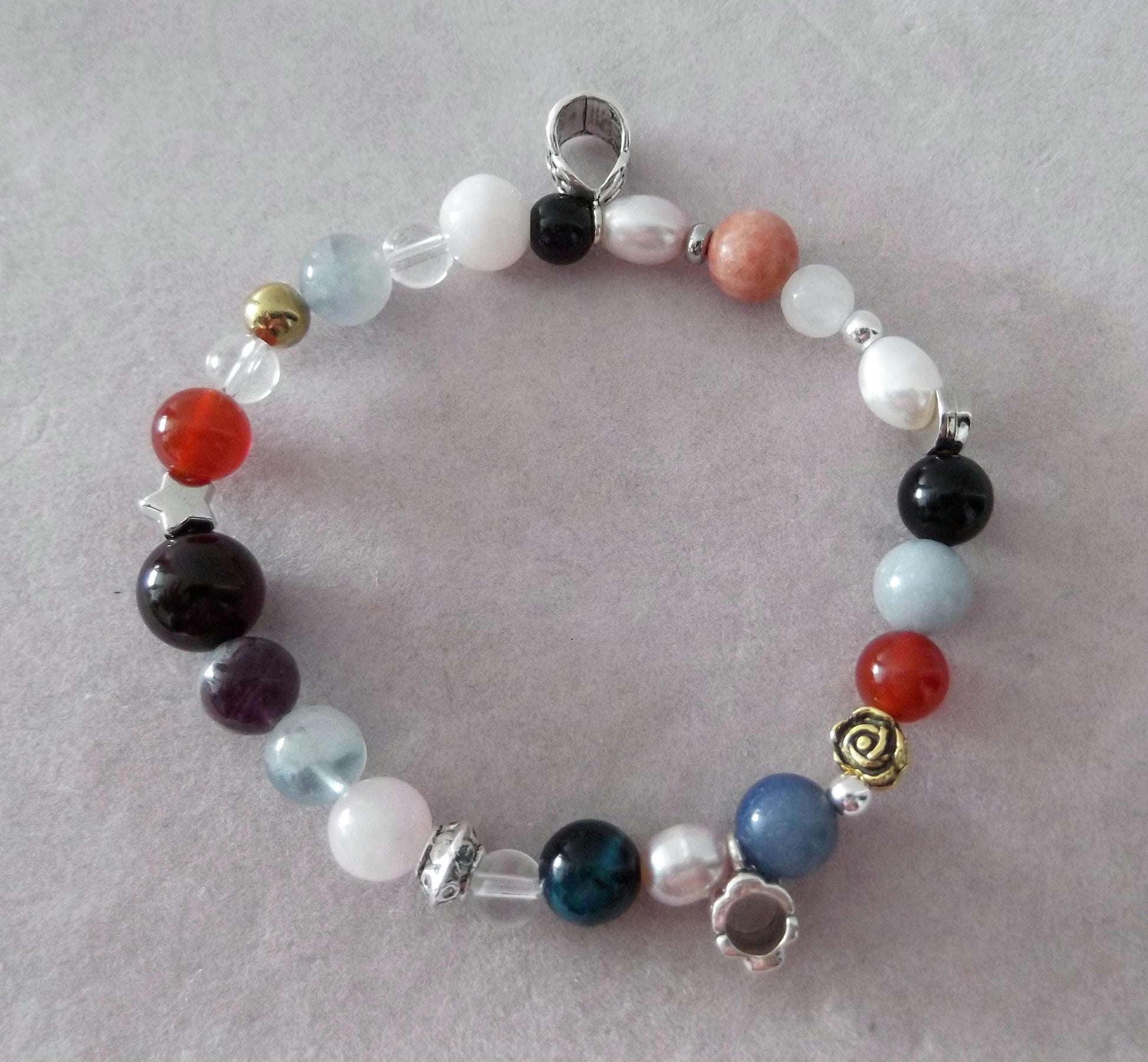 Gemstone Charm Bracelets! Happiness Peace & Clarity - Red Jasper - Orchid Calcite - Clear Quartz - Black and Orange Agate - Angelite - Amethyst - White Jade - Pink and Purple Freshwater Pearls - Black Agate - Blue Tiger Eye - Rainbow Fluorite - Rose Quartz - Purple Jade