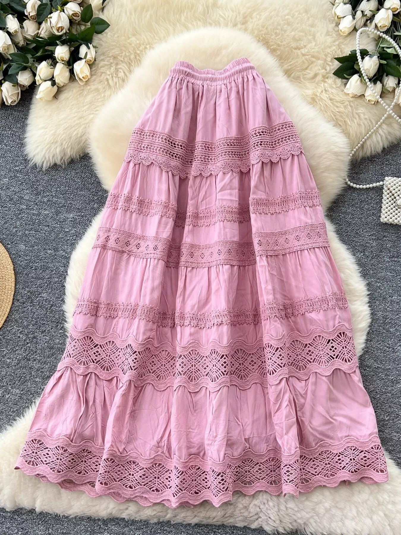 Pink lace-trim tiered skirt with drawstring waistband and ruffle rows
