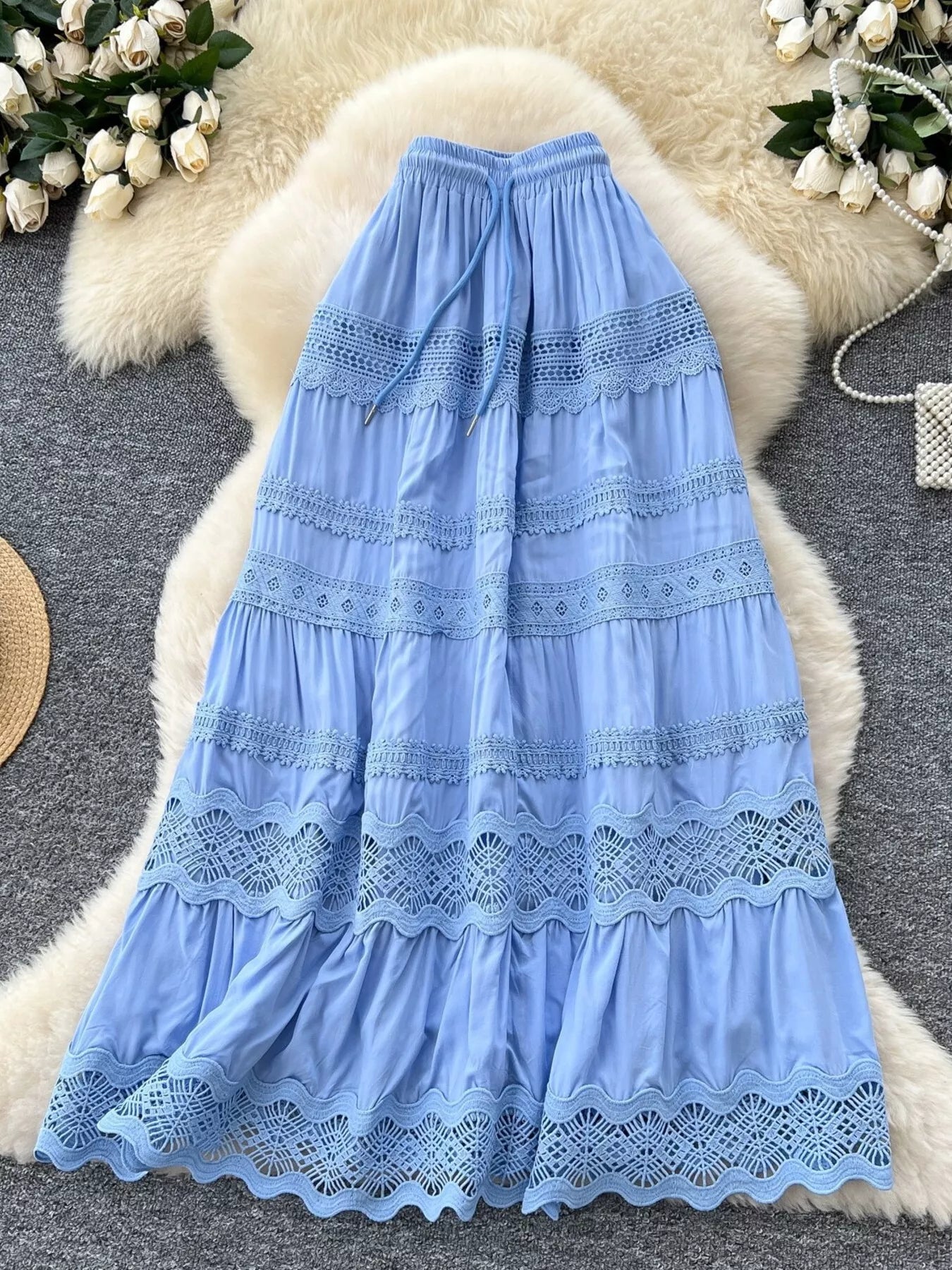 Blue tiered boho lace skirt with elastic waist and ruffled eyelet bands