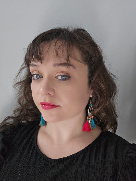 Boho tassel earrings with blue and red dangling tassels and bead accents