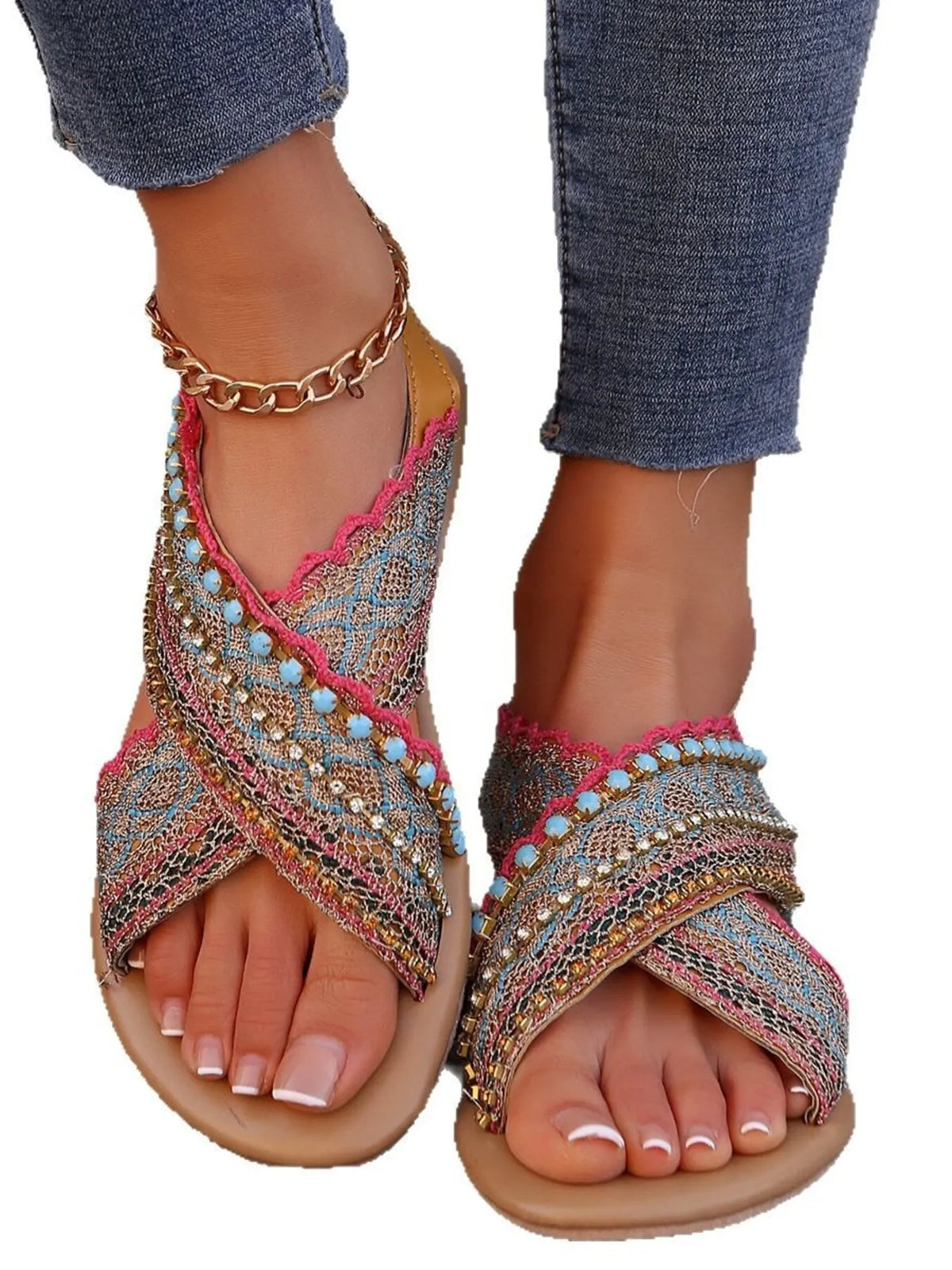 Beaded flat thong sandals with pink-edged crisscross toe strap and ankle chain